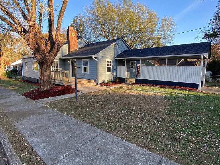 Situated on 2 corner lots (street on 3 sides of the home - only 1 neighbor).