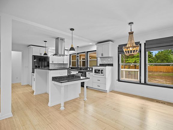 Open kitchen - with natural bamboo flooring