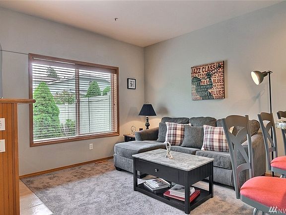 Living room with large window for plenty of light.