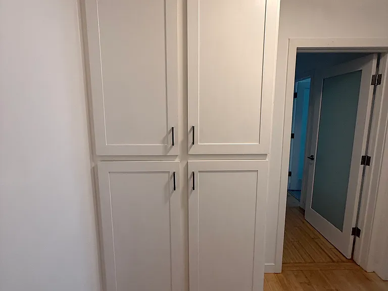 Linen closet off hallway to bedroom