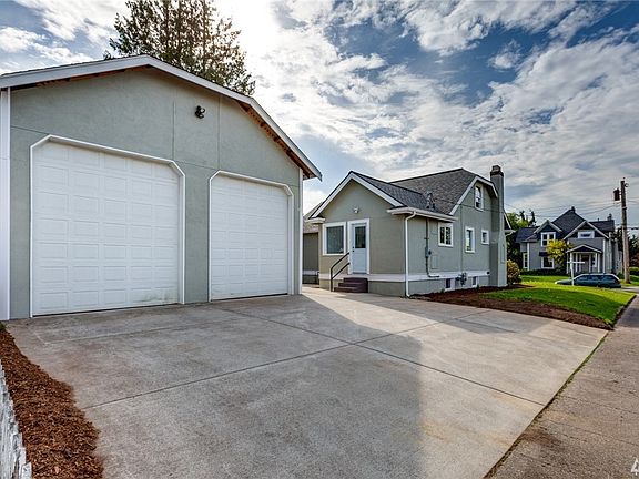 Detached garage/shop large enough for an RV, boat, and multiple vehicles.  