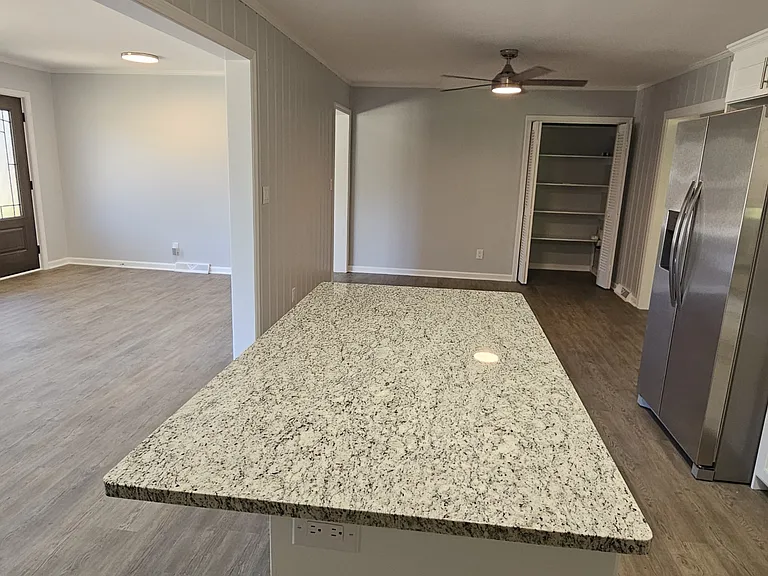 From kitchen - looking into eating area, pantry, & living room