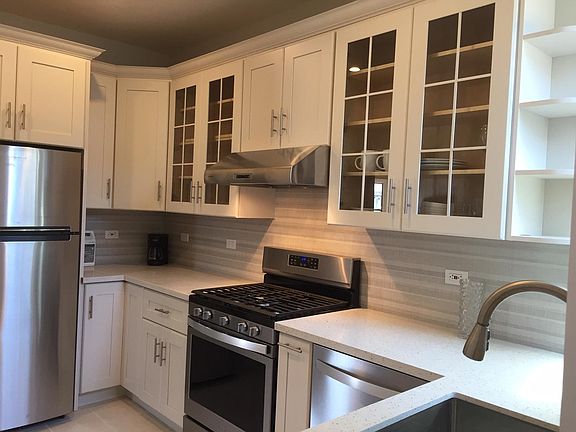 remodeled kitchen : New cabinet, Quartz countertops, Stainless Steel appliances/Gas stove.
