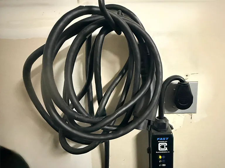 Electric car charging station (Charge your vehicle right from your home garage)