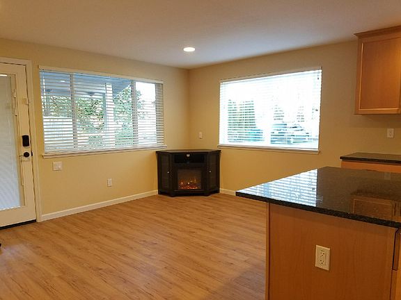 Living area with TV stand/fireplace