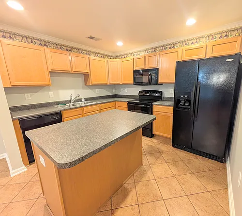7104 W Friendly Ave #103 Photo 1