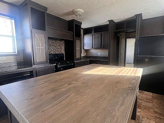 2nd image of 534 E 37th Ave Lot 238