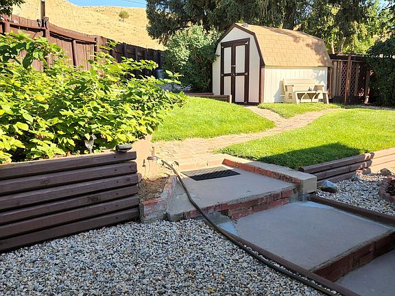 Back Yard with Storage shed from the patio area