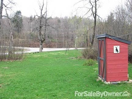 Well House
						:
						Looking out toward Larson/Jemtland Roads and small fruit orchard.