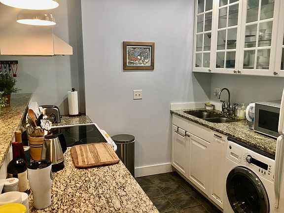 Kitchen- granite countertops and glass-top stove