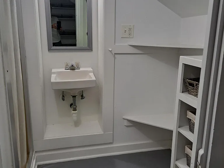 Bath room is small but has great storage. Shower is stall shower. Super clean and all recently updated.