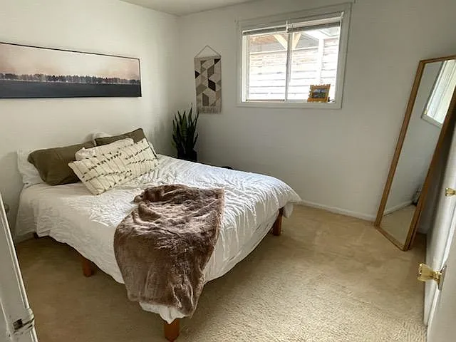 Bedroom 1 shown with furniture .