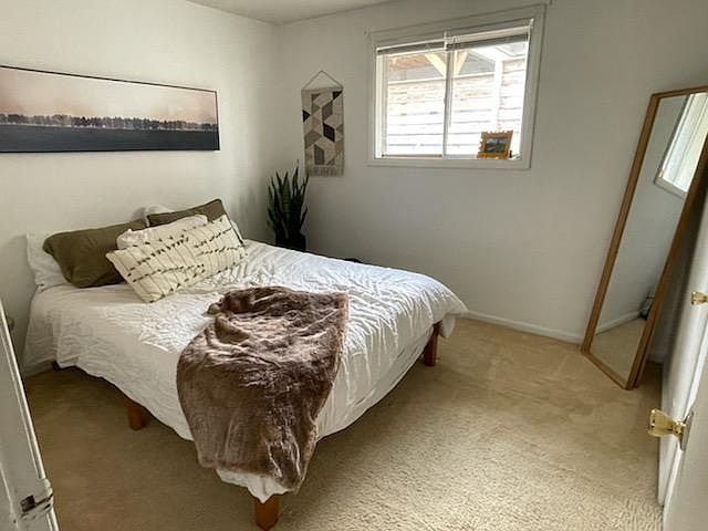 Bedroom 1 shown with furniture .