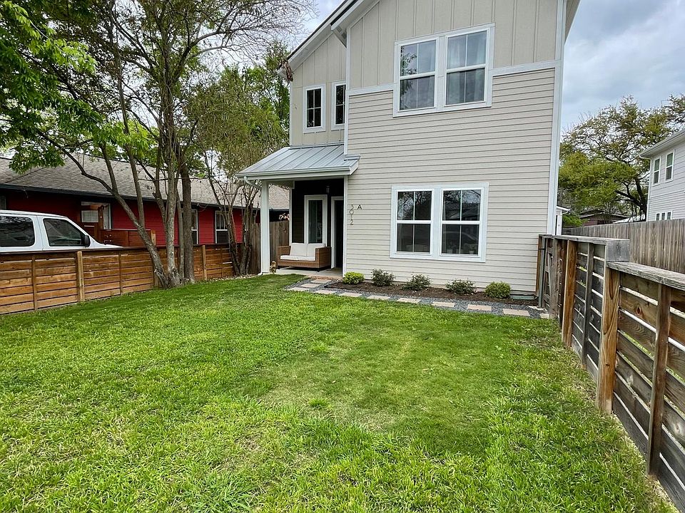 Front of house viewed from inside the fence!