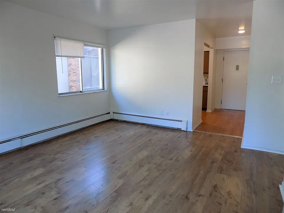 Entry & Living Room - Typically Furnished