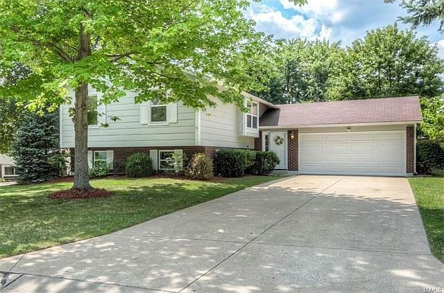 Warm and Inviting Curb Appeal welcomes you in.
