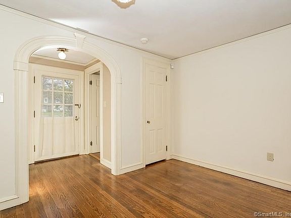 Beautiful floors begin at the front door and continue throughout the house. A second coat closet in the foyer.
