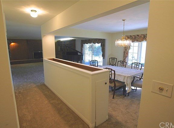 From the formal entry to the dining room and spacious living room
