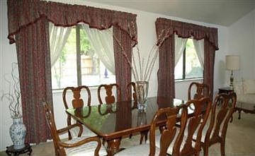 Formal Dining Room with cathedral ceilings and celestory windows
