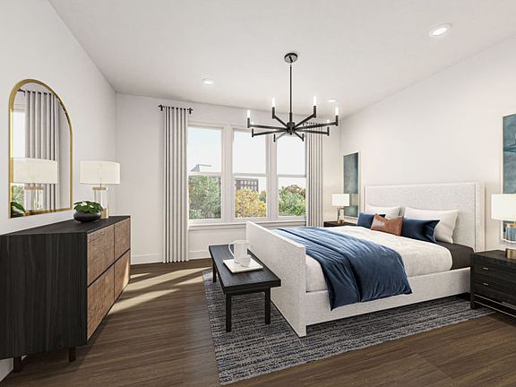 Elegant Owner s Suite with a Walk-In Closet and Private Bath