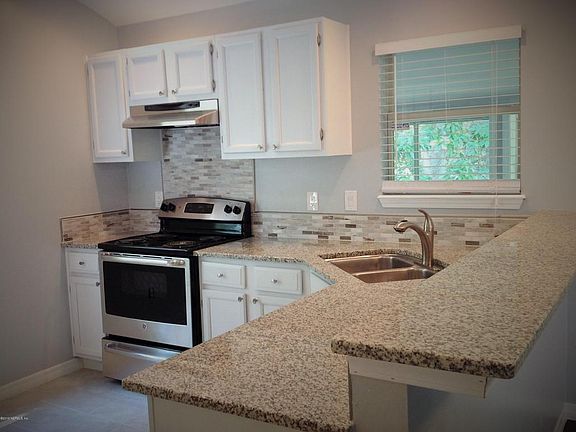 4th image of 10315 Homard Blvd N
