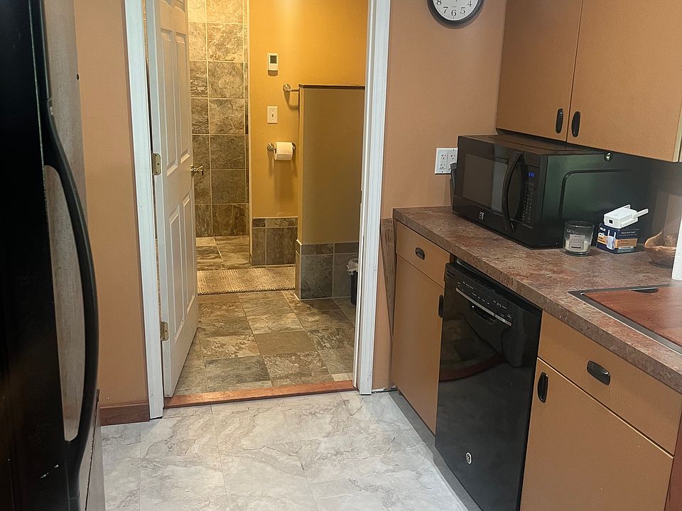 Looking the other way into the bath that has separate entrance from master bedroom.