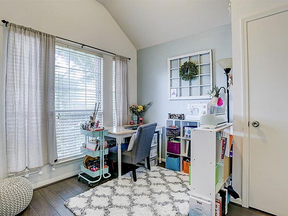 Fourth bedroom option located at the front of the home that is being used as an office/craft room. Lots of natural light.