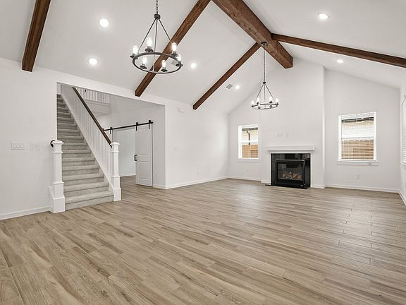 Great room featuring warm fireplace