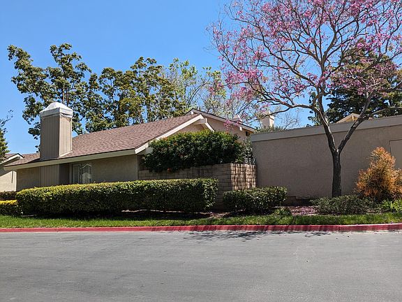 End-unit condo with 2-car garage