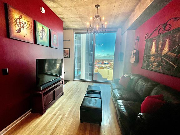 Living room with views of Nissan Stadium.