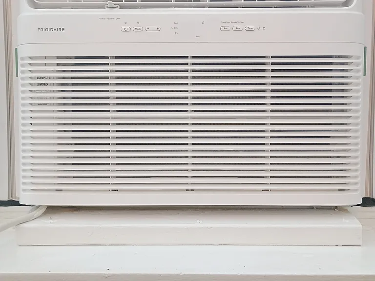 New 230v 28k BTU centrally located window unit. Cools the entire unit!