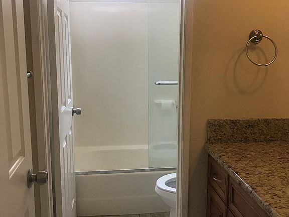 Bath tub, tile in bathroom