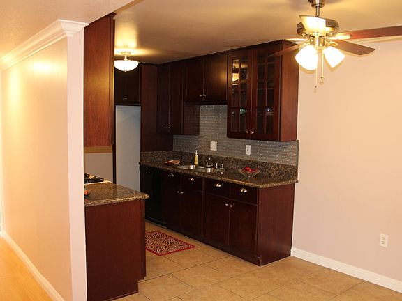 Brand new kitchen with Real wood cabinets and self closing doors with new Dishwasher And adjacent to the dining room