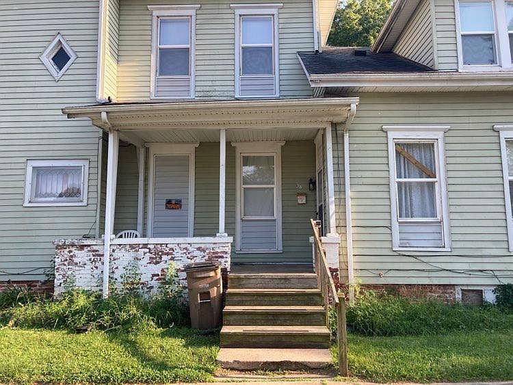 Front door - North side of home facing 12th St. (5 steps)