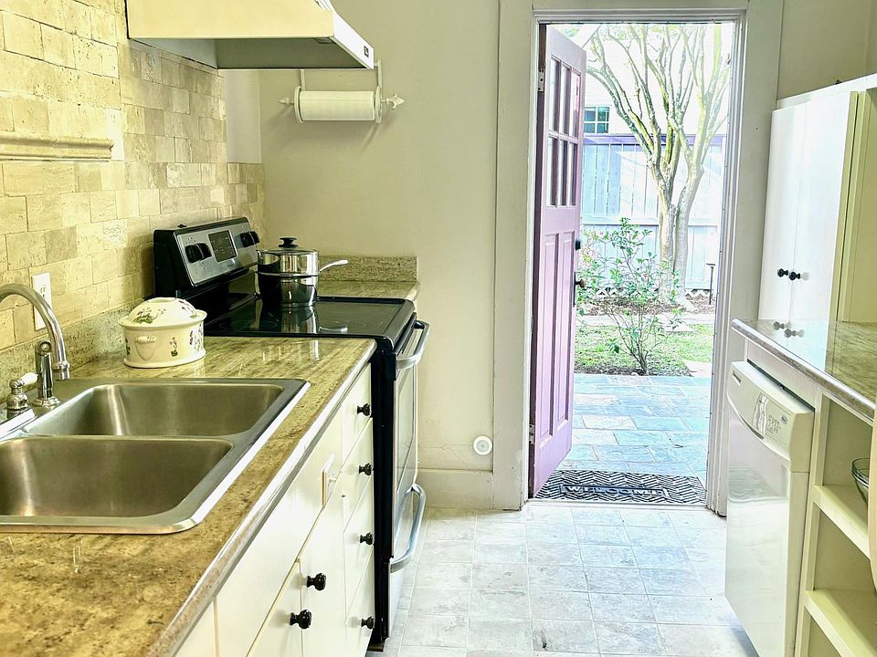 Kitchen opens up to Patio and Garden - great for visiting and pets. Fully equipped kitchen will delight any cook.