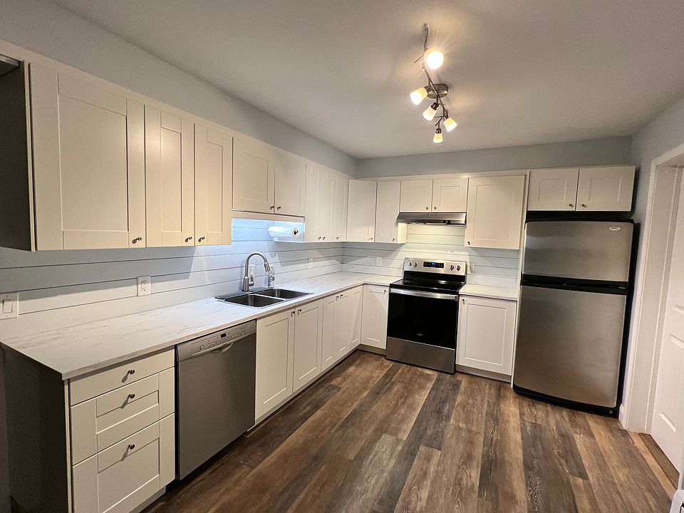 Large updated kitchen with all new stainless steel appliances.