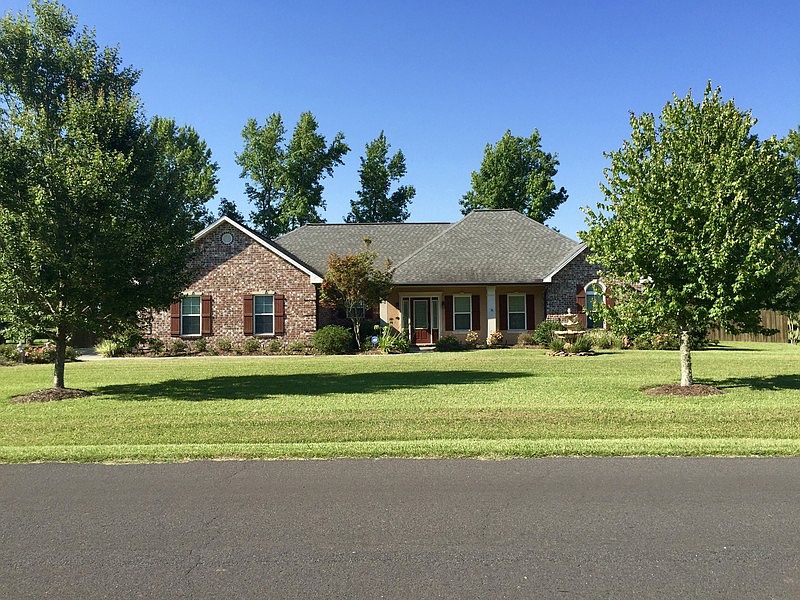 368 Meghan Drive
						:
						Home with landscaping, trees, and fountain