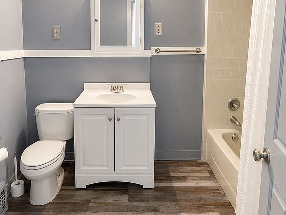 Full bathroom recently, remodeled with new vanity flooring, toilet, located on second floor of home.