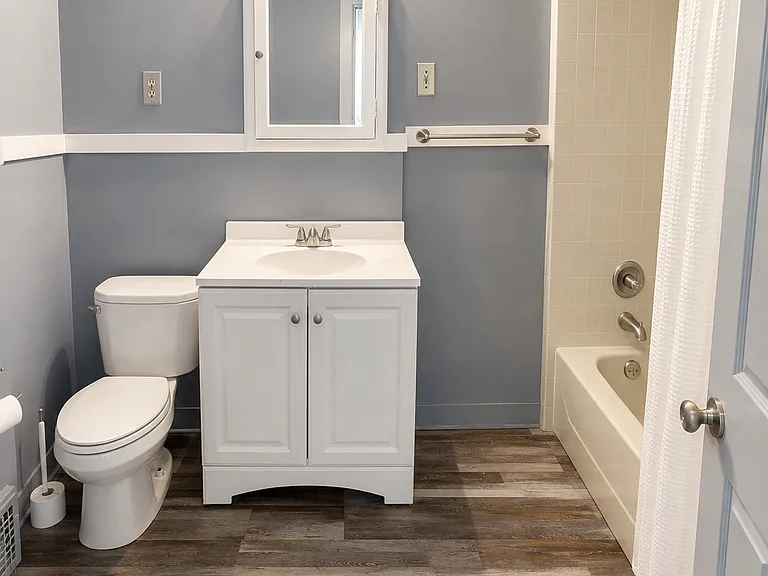 Full bathroom recently, remodeled with new vanity flooring, toilet, located on second floor of home.