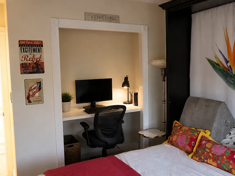 Desk set up or closet option.