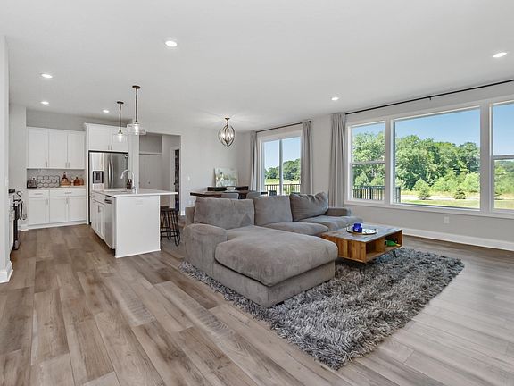 Open-concept kitchen/living/dining room