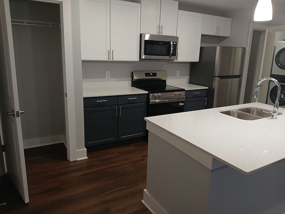 One Bedroom Kitchens with new quartz countertops. New Appliances including dishwasher, garbage disposal and ice maker.