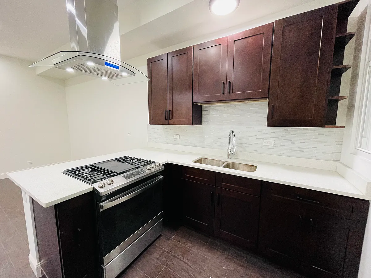 Building Photo - 2878 S Archer Ave #2R