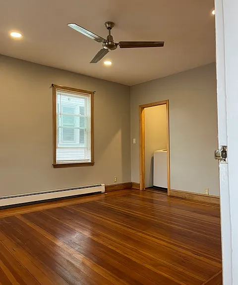 Living Room, Angle 2. Looking towards Laundry Closet