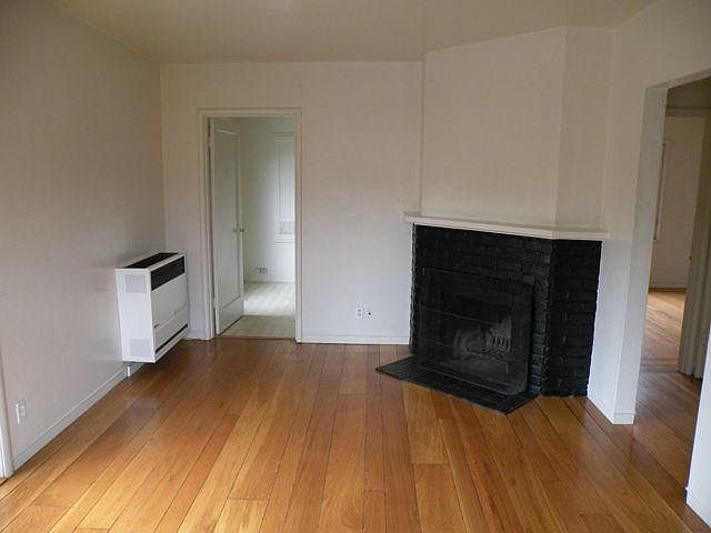 Hardwood floors. Wood burning fireplace. Heater. 