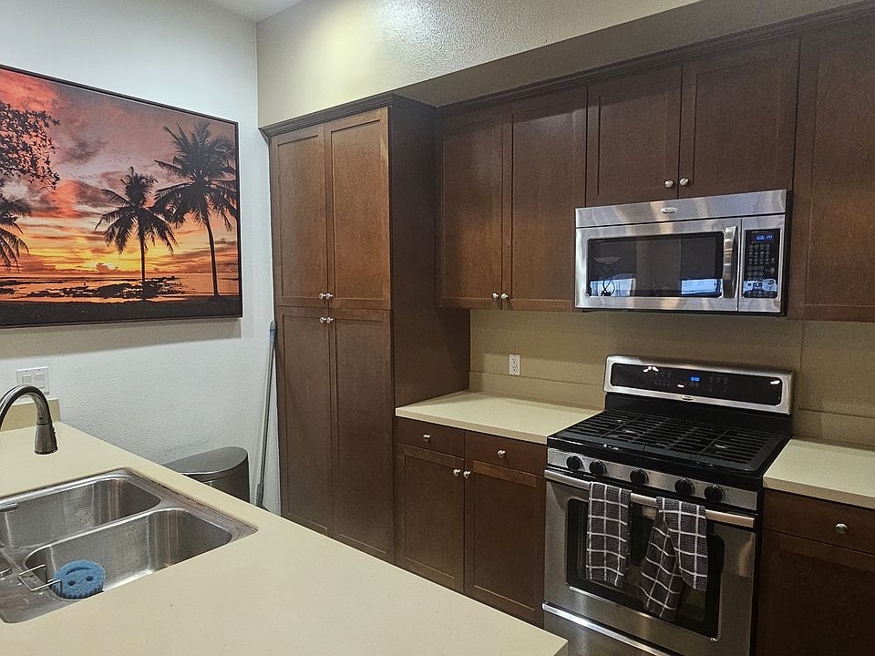 Kitchen features plentiful storage cabinets