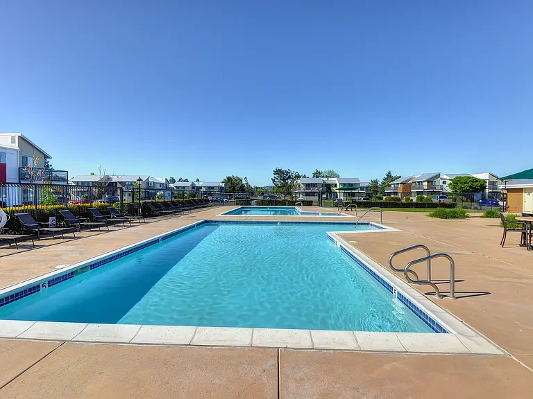 Community Swimming Pool and Lounge Seating