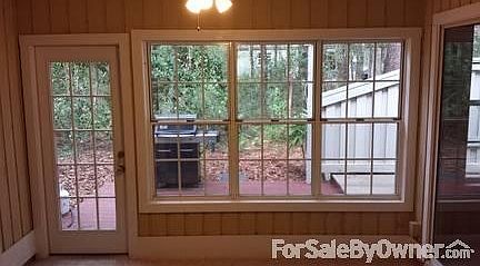 Florida Room and Patio with private wooded lot