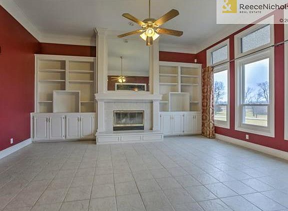 Stunning living room with high, high ceilings, floor to ceiling