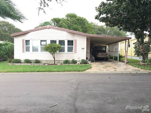 Front of home and carport